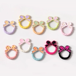 Kleurrijke veerring gespen met polkadots strik voor DIY sleutelhanger accessoires