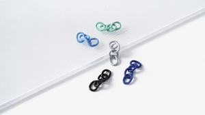 Macro shot of colorful matte alloy chain links and spring rings for DIY jewelry craft