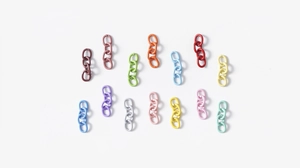 Close-up of colorful acrylic link chains in 14 vibrant shades for DIY accessory making