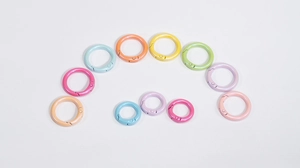 Close-up of colorful metal spring O-rings in macaron tones for DIY keychains and bags