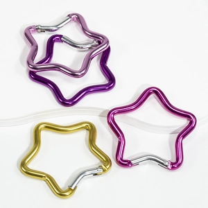 Star shaped colorful metal spring buckles for DIY keychains in purple and gold colors