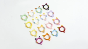 Array of colorful cat-shaped spring rings in 16 vibrant painted metal colors