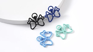 Set of four colorful bow-shaped metal spring hooks for DIY keychains and accessories