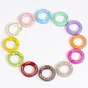 Set of twelve colorful rhinestone spring rings for DIY keychains and bag accessories