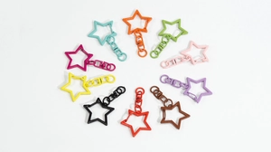 Detailed overhead view of star-shaped alloy lobster clasps in ten vibrant candy colors