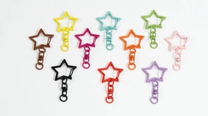 Detailed view of colorful star-shaped alloy lobster clasps for DIY keychain accessories