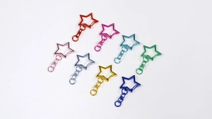 Eight-piece colorful star-shaped alloy keychains with 360-degree rotating lobster clasps