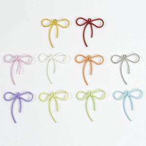 Kleurrijke strikbedeltjes van legering voor DIY-sieraden en telefoonkettingen maken