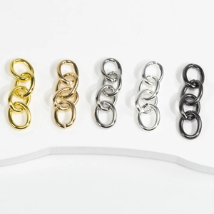 Connettori per catene in metallo in cinque finiture tra cui oro e argento per il fai-da-te