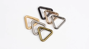Triangle spring snap hook assortment in six metal finishes like silver and rose gold