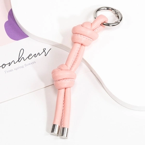 Portachiavi in pelle rosa con nodo e anello a molla argento per ciondolo da borsa