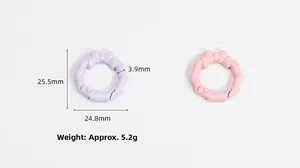 Detailed view of octagon spring ring buckle with bow decoration and size measurements