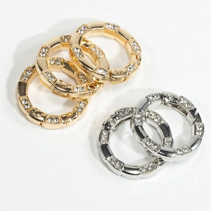 Bamboo-style spring O-ring connectors with inlaid rhinestones in gold and silver finish