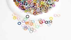 Close-up of 10mm colorful lacquered iron jump rings for DIY jewelry and keychains