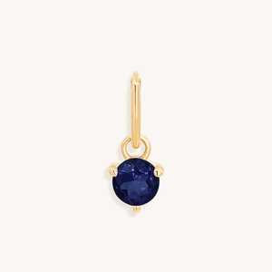 Gouden roestvrijstalen geometrische hanger met gefacetteerde blauwe geboortesteen