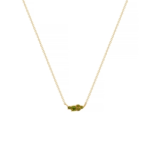 Detail view of 18k gold plated titanium necklace with five green round gemstones