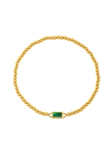 Bracciale a sfere dorate minimalista con un ciondolo rettangolare in smeraldo verde