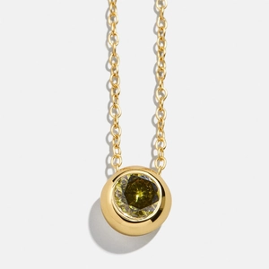 Minimalist gold-plated birthstone necklace featuring a bezel-set yellow-green zircon pendant