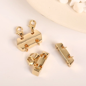 Detailed macro view of gold-plated layered magnetic necklace clasp for jewelry making