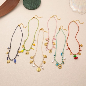Handmade woven cord necklace set with lotus flower and nautical pendants in vacuum plating