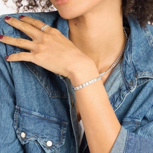 Detail of hip hop style Cuban chain necklace and tennis bracelet set with zircon stones