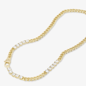 Detail of gold Cuban chain necklace featuring a zircon tennis chain section and secure clasp