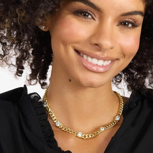 Flat Cuban link necklace in gold plating with five round-cut cubic zirconia accents
