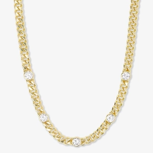 Detail of gold-plated Cuban link necklace featuring five round bezel-set cubic zirconia