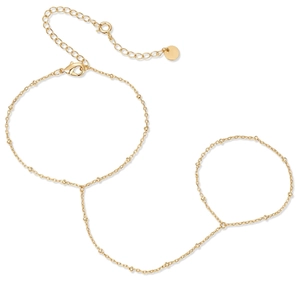 Detailed close-up of 18k gold plated stainless steel slave bracelet with small beads