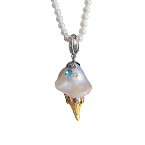 Baroque pearl ice cream pendant necklace with gold metal cone on white pearl chain