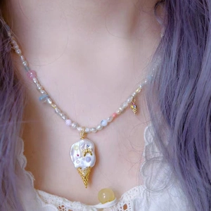 Baroque pearl ice cream pendant necklace with 18k gold plating on a pearl beaded chain
