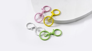 Macro shot of colorful matte alloy spring ring and lobster clasp DIY keychain accessories