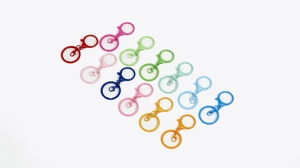 Macro shot of colorful alloy lobster clasps and keyrings for DIY jewelry making