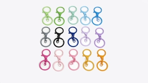 Detailed flat lay of colorful alloy lobster clasps and key rings for DIY jewelry accessories