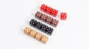 Detailed view of colorful acrylic dice beads with white dots for DIY jewelry making
