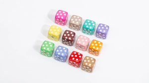 Close-up of colorful acrylic square beads with white dots for DIY jewelry making