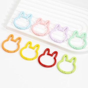 Colorful rabbit-shaped metal spring rings for DIY keychains and bags in eight vibrant colors