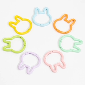 Rainbow macaron bunny spring rings in various pastel colors for DIY keychain making