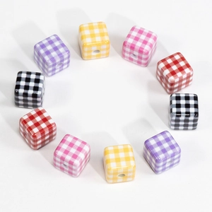 Colorful plaid acrylic cube beads in five vibrant colors arranged in a circle for DIY crafts