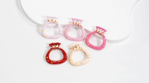 Macro view of five-color fortune bag spring snap hooks with lucky Fu character embossing