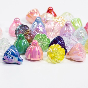 Iridescent lotus seed pod charms in multiple bright colors for DIY jewelry and phone chains
