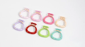 Macro shot of colorful lucky bag spring buckles with engraved Chinese Fu characters
