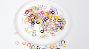 Close-up of colorful twisted rope jump rings in candy colors for DIY jewelry making