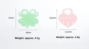 Detail view of acrylic green clover and pink heart lock charms with weight and size specs
