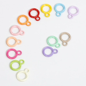 Colorful twisted metal ring charms for DIY jewelry making in thirteen various bright colors
