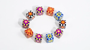 Macro shot of checkered floral square beads for DIY jewelry and phone chain making