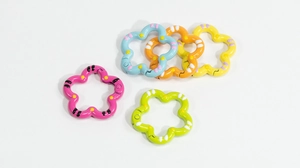 Detailed view of five colorful flower-shaped alloy carabiner rings with hand-painted patterns