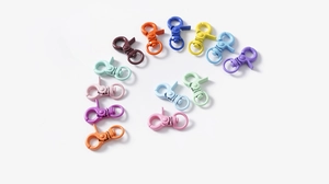 Close-up of colorful alloy lobster clasps for DIY jewelry making in various vibrant finishes