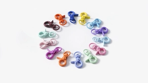 Macro detail of colorful spring lobster clasps for DIY jewelry in a circular arrangement