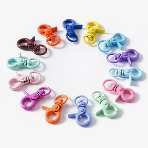 Colorful alloy lobster clasps in a circular layout for DIY jewelry and keychains